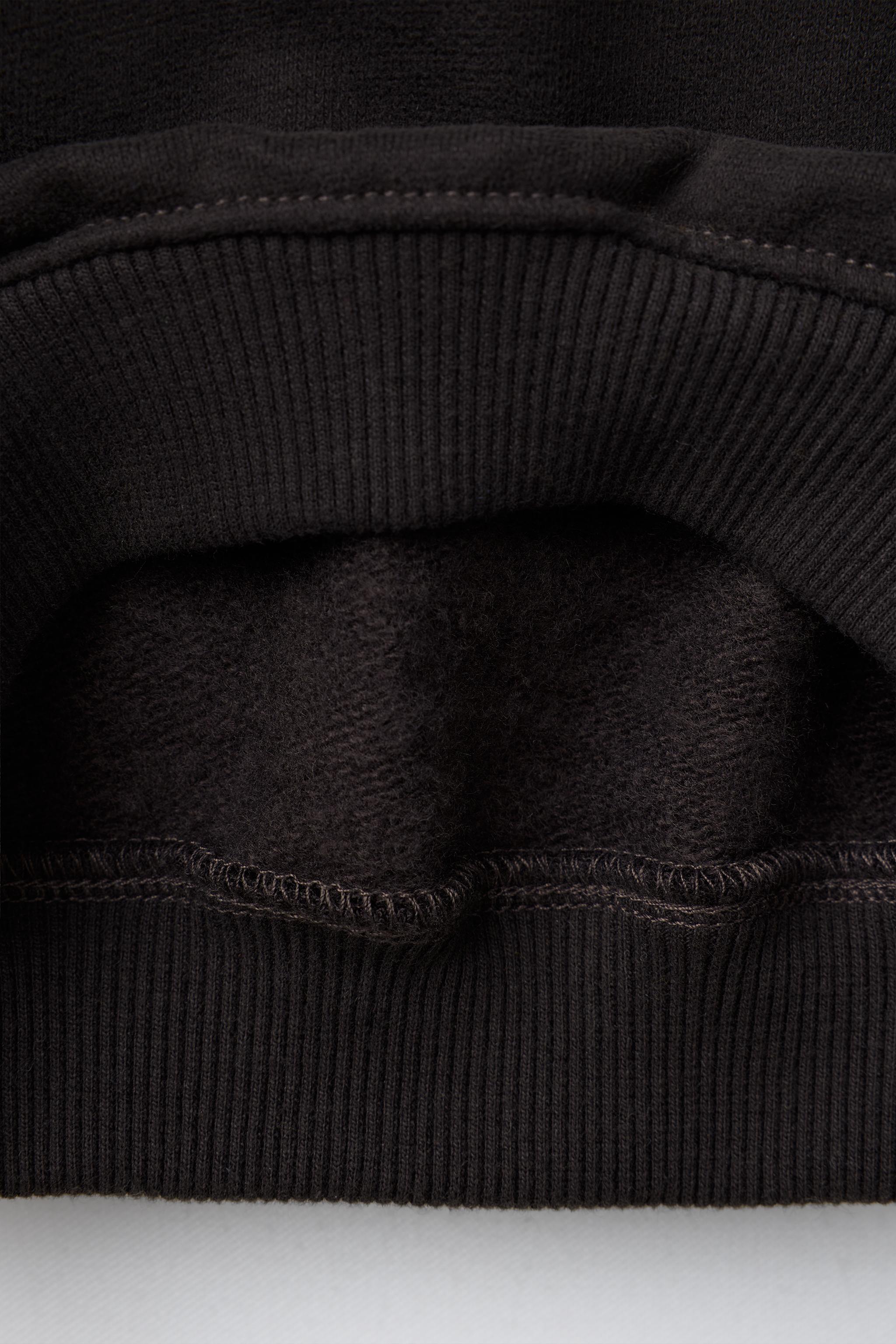 SWEAT-SHIRT UNI À COL CHEMINÉE